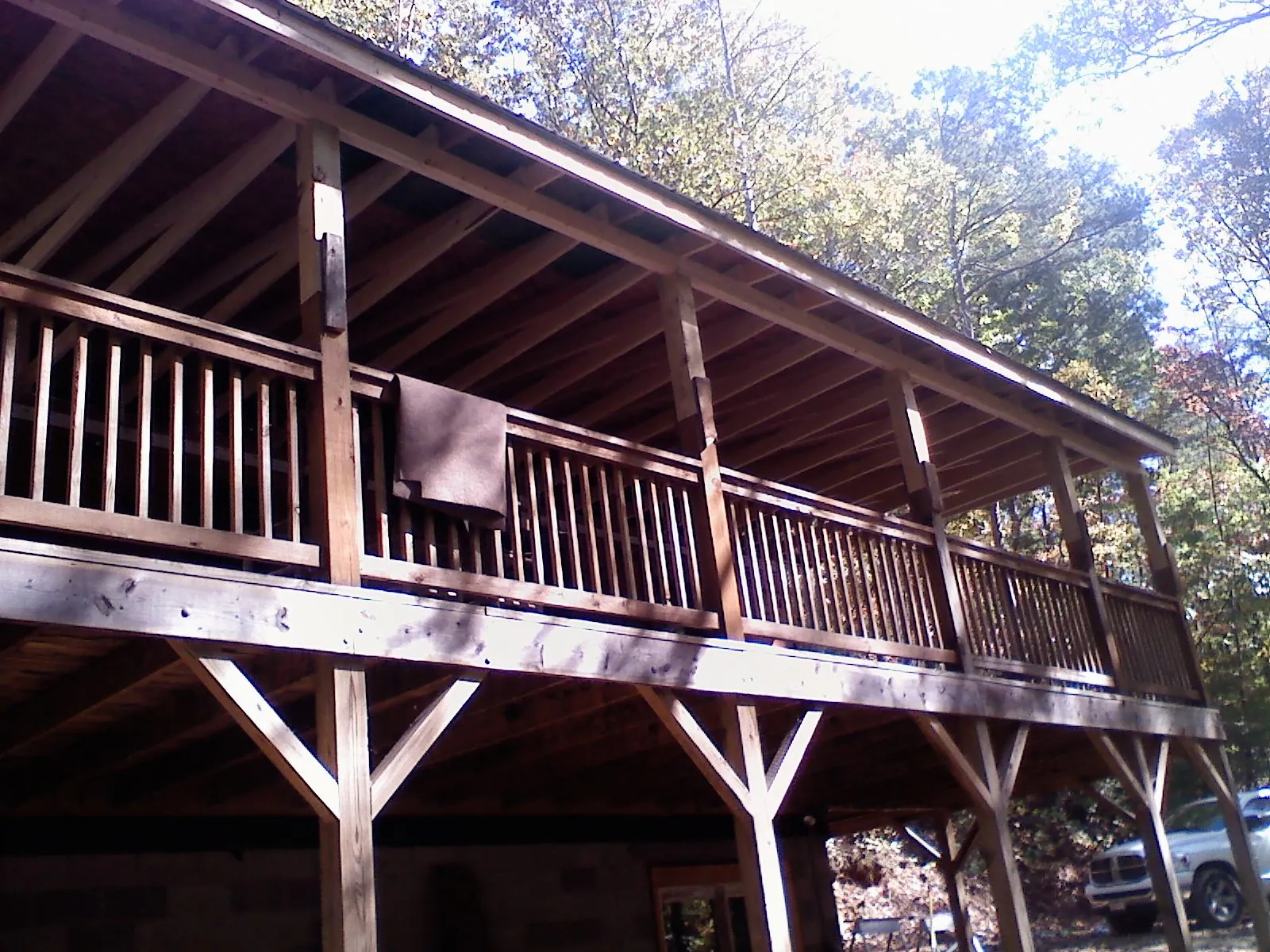Timber framing under a new elevated porch and deck — Roof Leak Repair in Dry Fork by Roofing Brothers